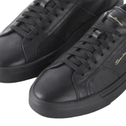 Santoni Sneaker aus Leder schwarz Schnürschuhe